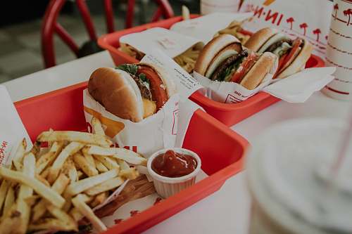 hot dog hamburger and fries with sauce chair